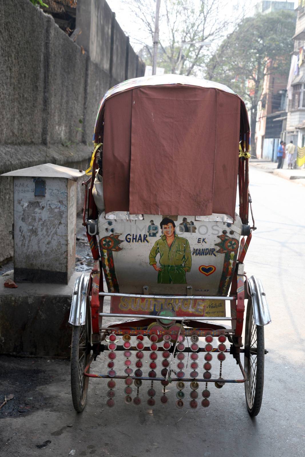 Rickshaw taxi in Kolkata on February 01, 2009. The cheaper and simplest public transportation which give poor people work.