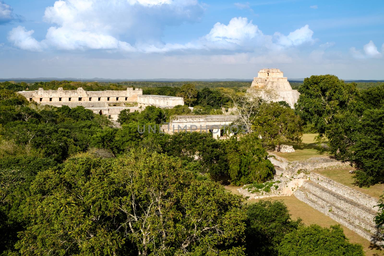 Landscape view of Uxmal archeological site with pyramids and rui by martinm303