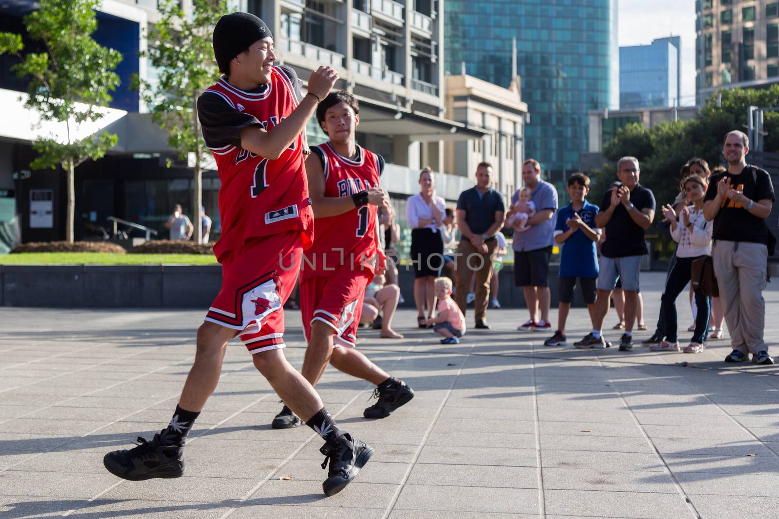 MELBOURNE/AUSTRALIA - JANUARY 22: Street performers entertaining crowds in Southbank during the 2016 Australian Open tennis tournament.