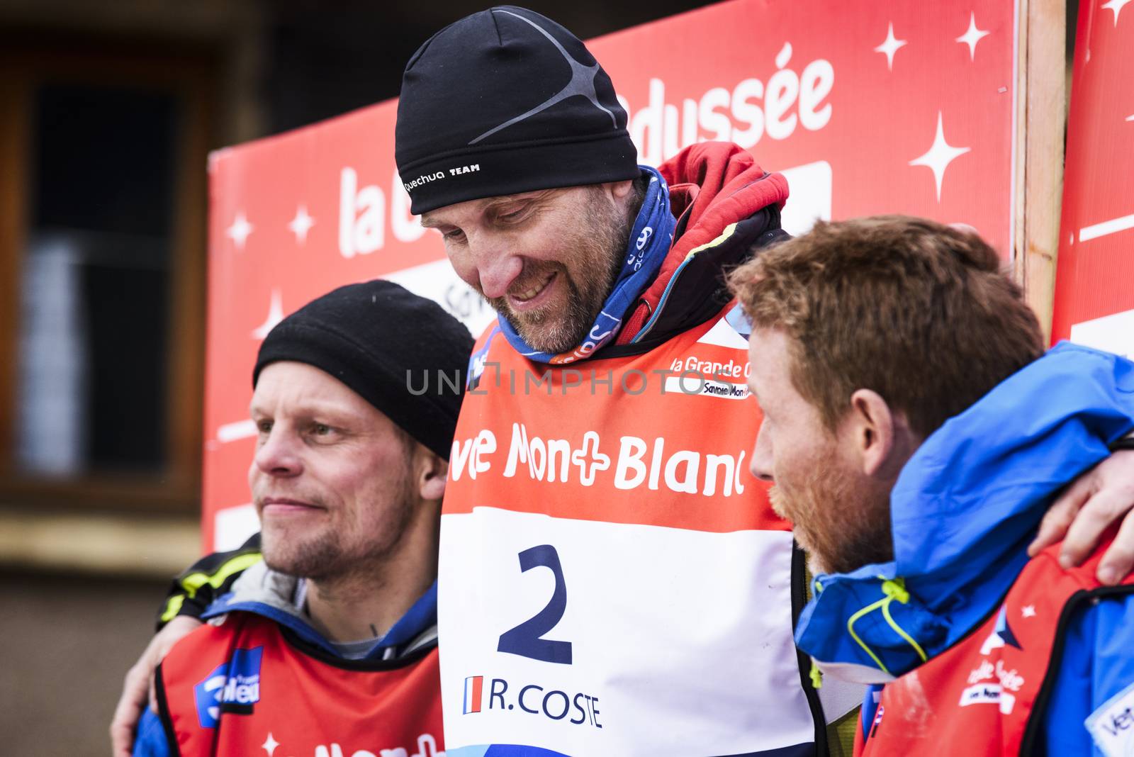TERMIGNON, VANOISE, FRANCE - JANUARY 20 2016 - The podium Remy COSTE the winner of the GRANDE ODYSSEE the hardest mushers race, the 2nd Jimmy PETTERSSON and 3th named Jean-Philippe PONTHIER, Vanoise, Alps