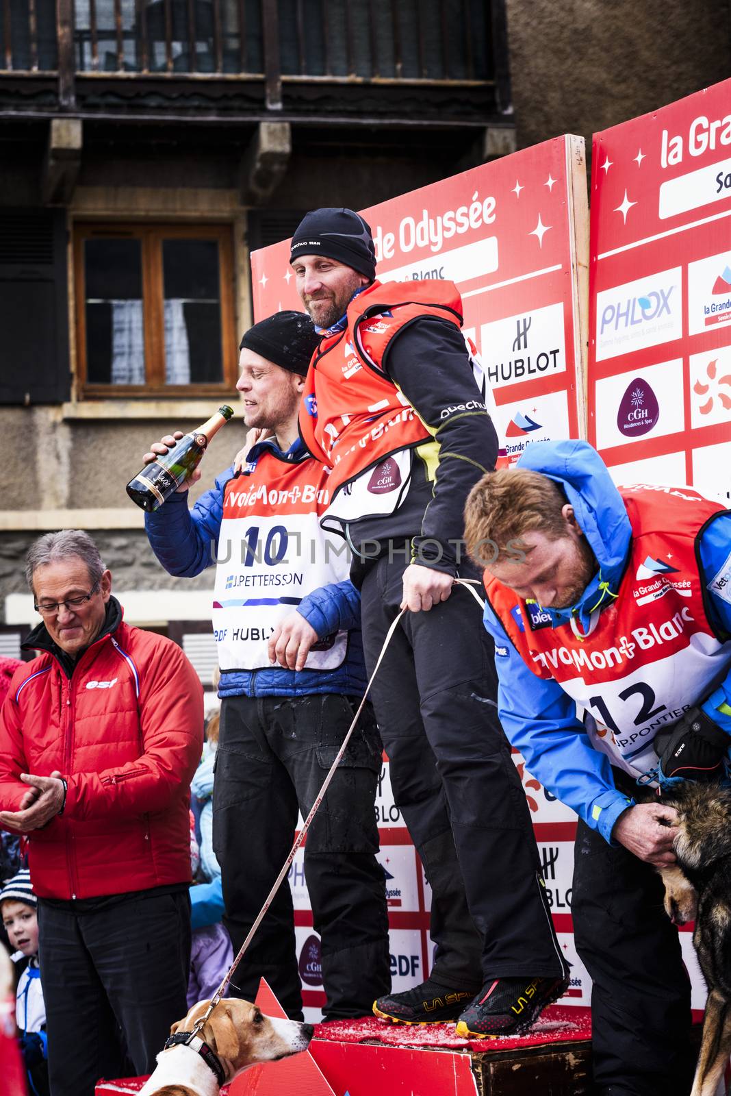 TERMIGNON, VANOISE, FRANCE - JANUARY 20 2016 - The podium Remy COSTE the winner of the GRANDE ODYSSEE the hardest mushers race, the 2nd Jimmy PETTERSSON and 3th named Jean-Philippe PONTHIER, Vanoise, Alps