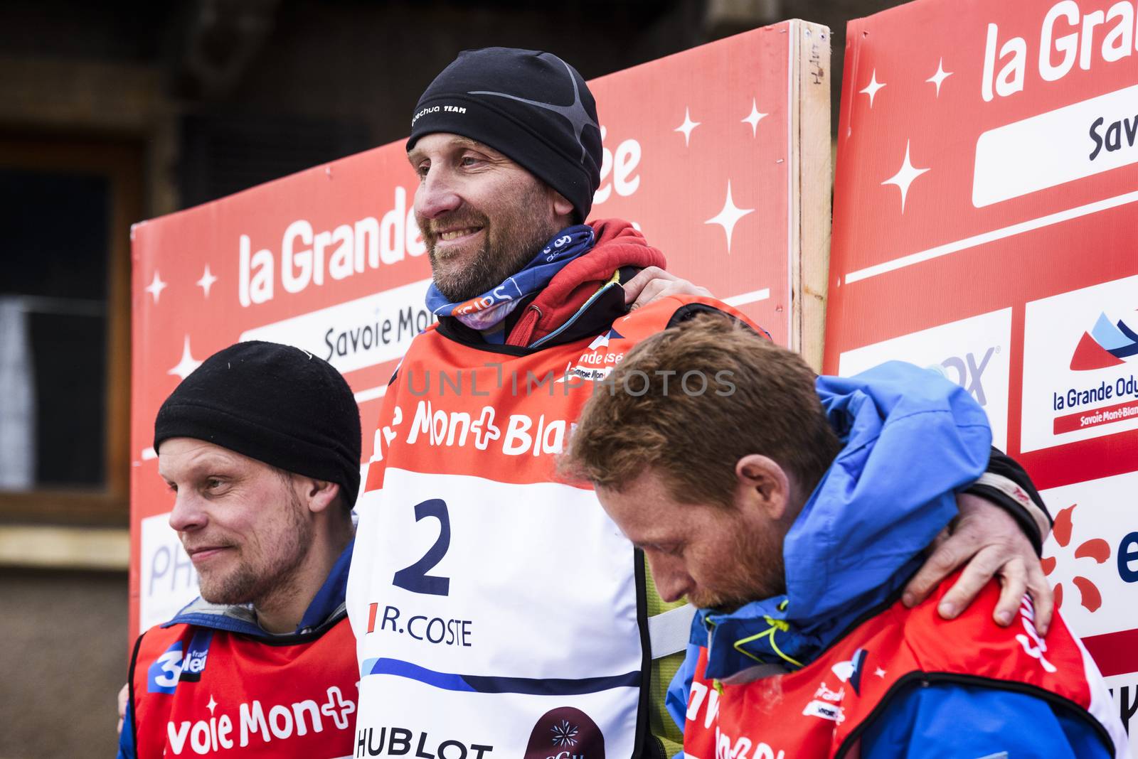 TERMIGNON, VANOISE, FRANCE - JANUARY 20 2016 - The podium Remy COSTE the winner of the GRANDE ODYSSEE the hardest mushers race, the 2nd Jimmy PETTERSSON and 3th named Jean-Philippe PONTHIER, Vanoise, Alps