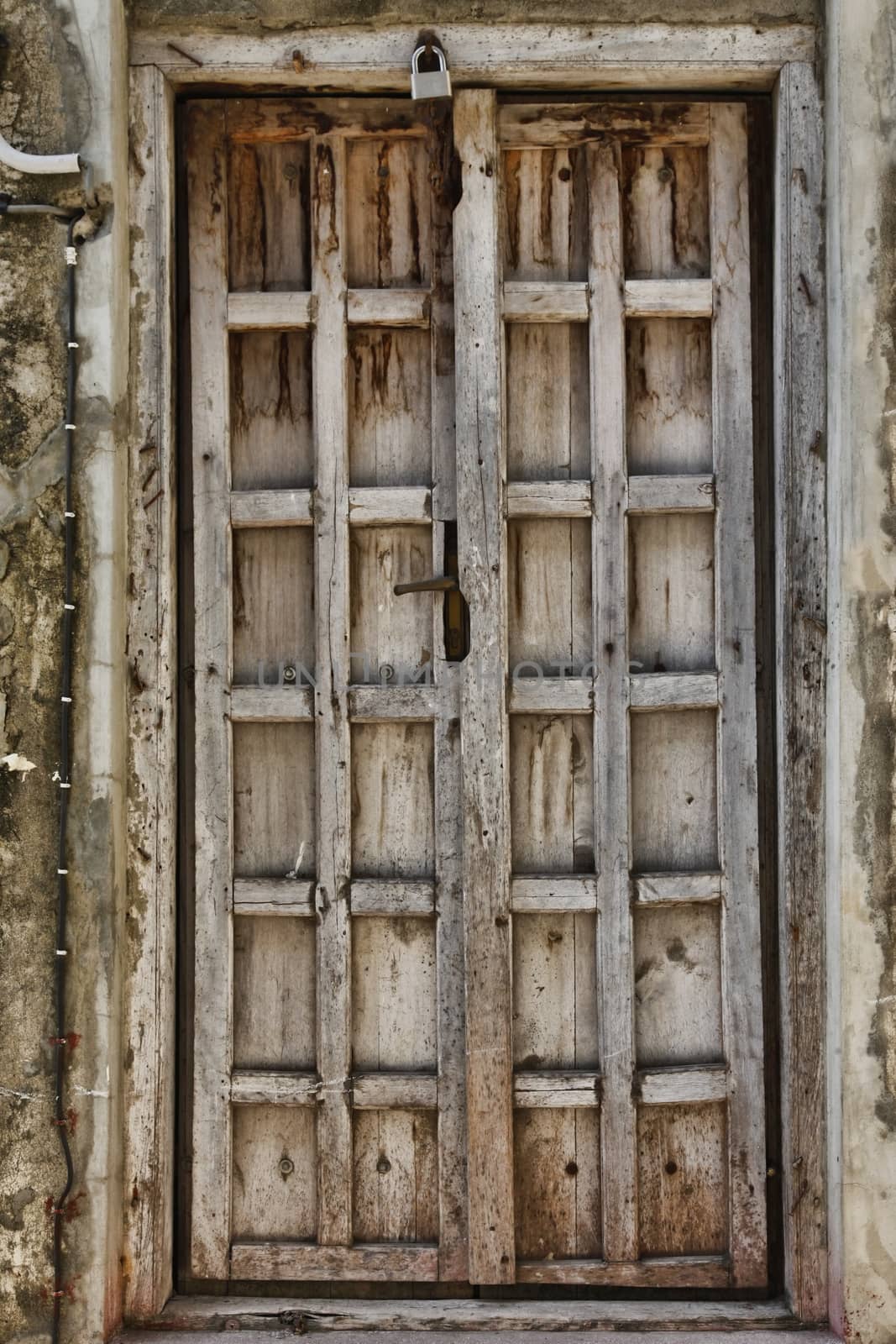 Old wooden door at Stone Town the capital of Zanzibar island East Africa.
