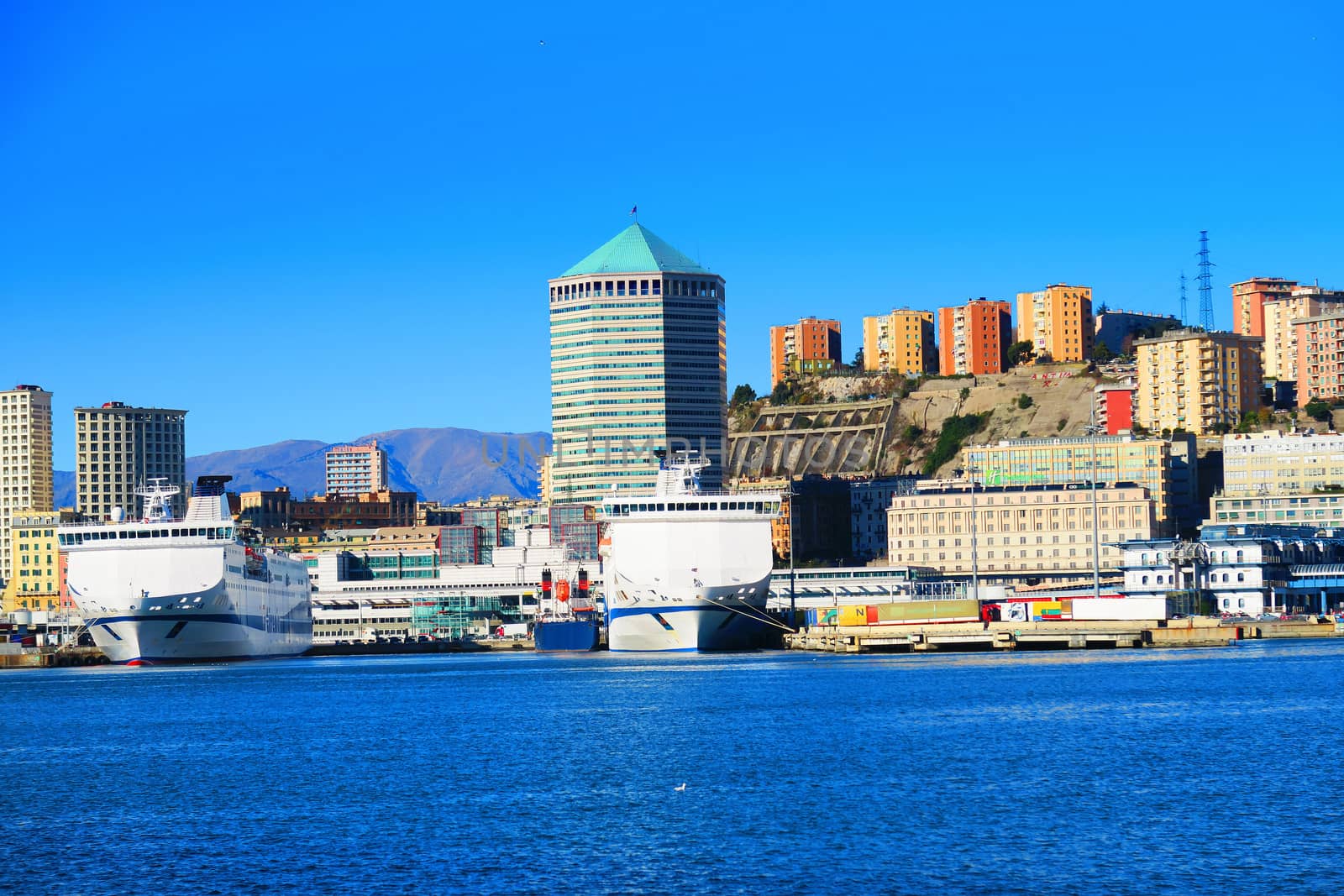 View of the port of Genoa. It is clearly visible the famous "Matitone", an octagonal skyscraper 109 meters high.