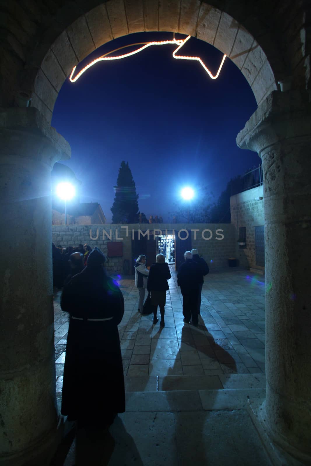 Franciscan monk in the Church of Jesus' first miracle. Franciscans in the Holy Land take care about most of the churches and shrines., Cana, Israel on December 30, 2007.