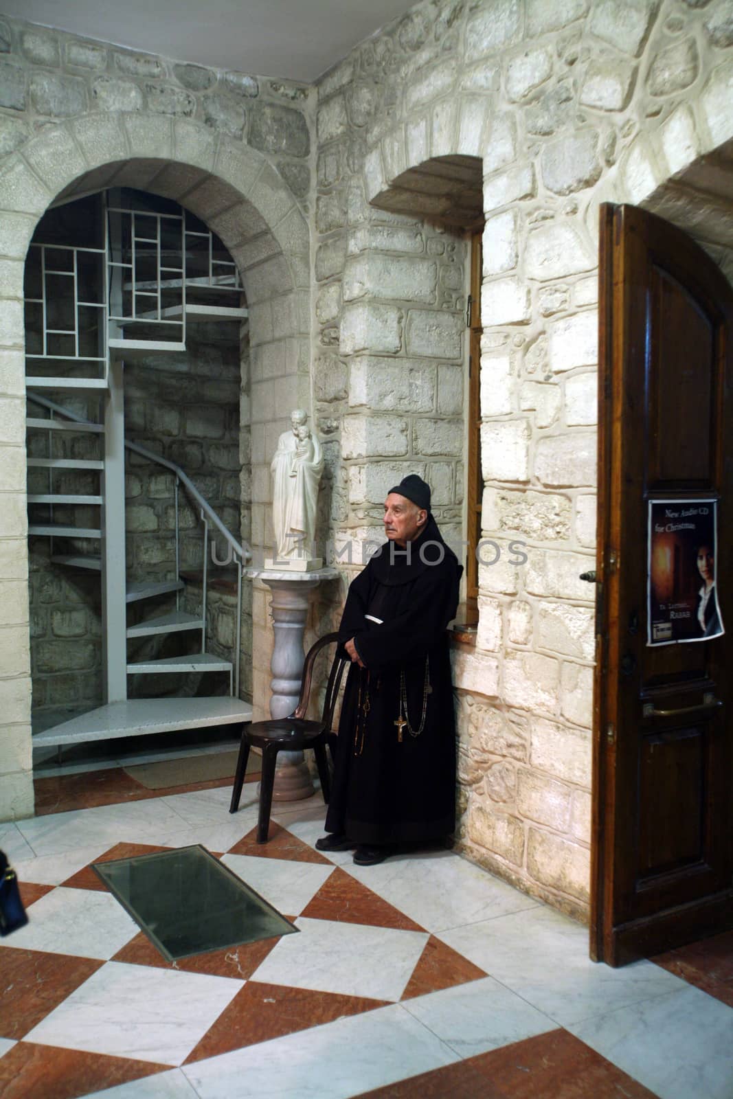 Franciscan monk in the Church of Jesus' first miracle. Franciscans in the Holy Land take care about most of the churches and shrines., Cana, Israel on December 30, 2007.