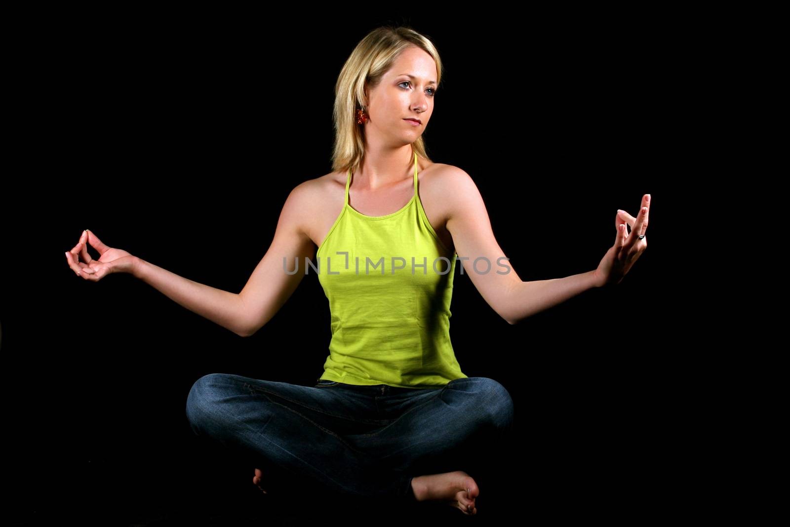 Blonde girl meditating
