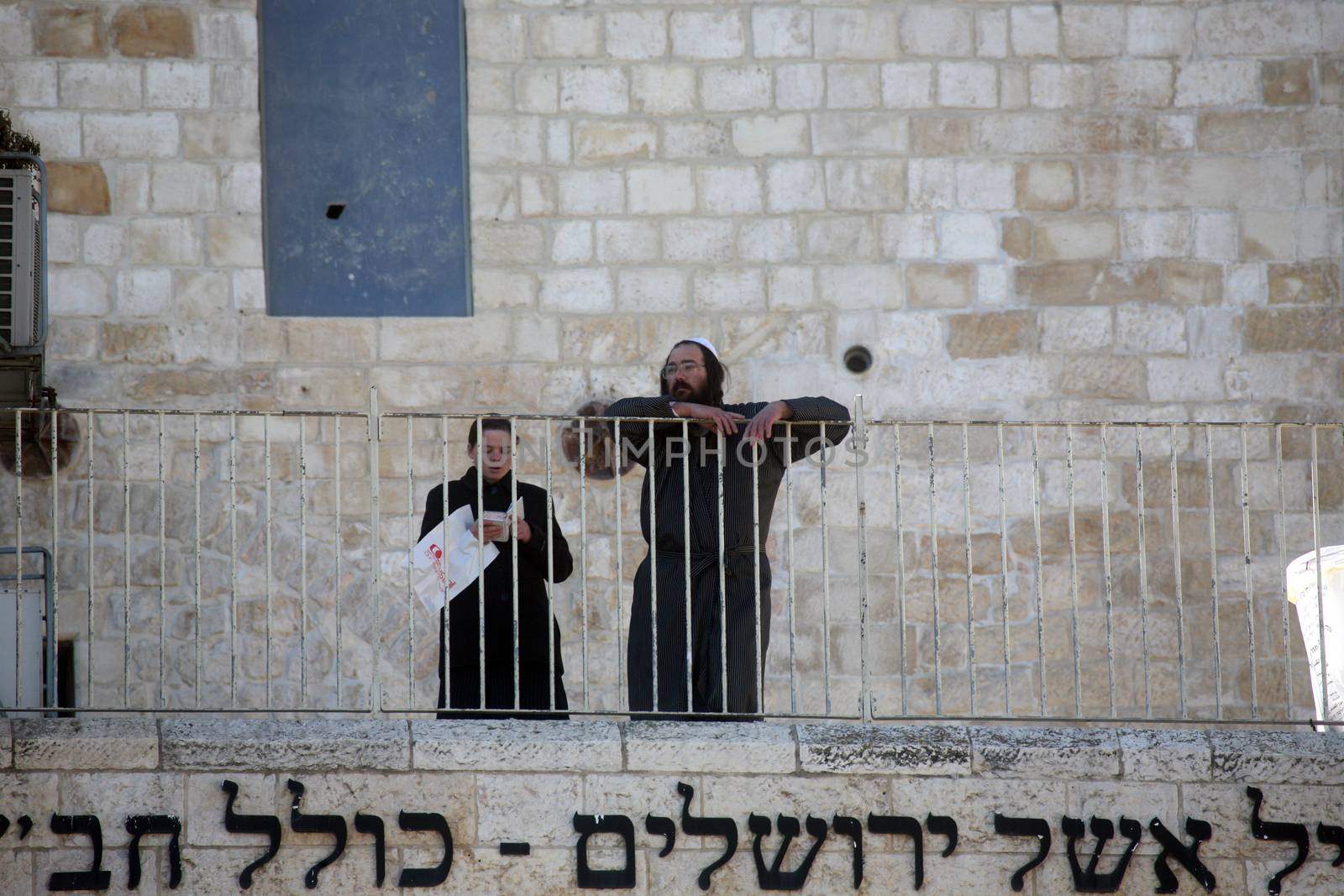 Jewish men pray at the western wall January 02, 2008 in Jerusalem, IL. The wall is one of the holiest sites in Judaism attracting thousands of worshipers daily.