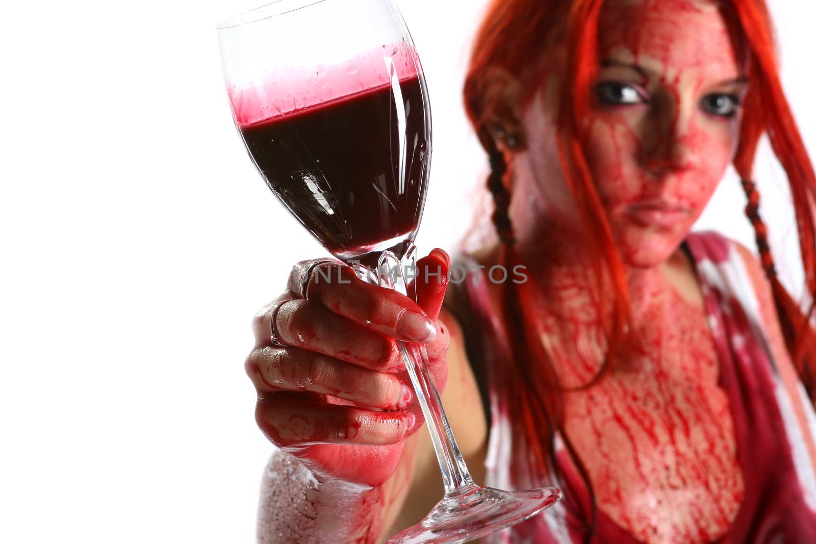 Beautiful red hair girl covered in blood