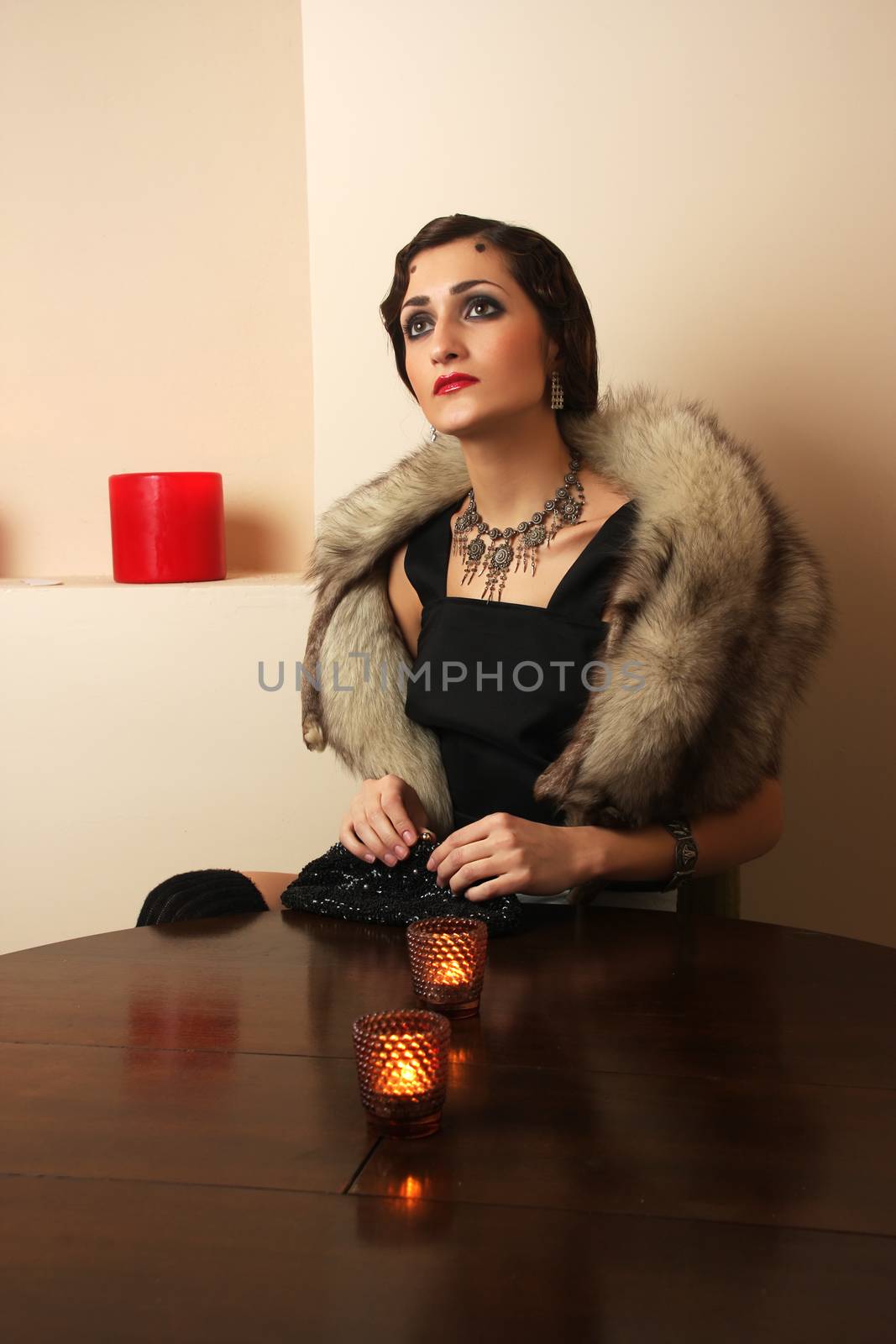 Beautiful lady waiting on the staircase