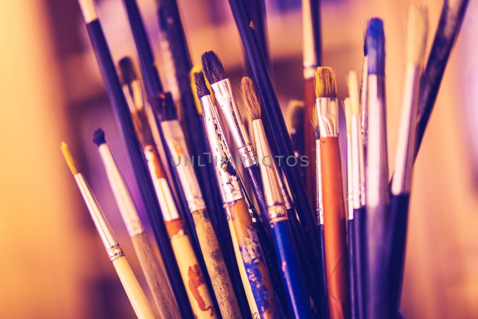 Dirty Colorful Oil Paintbrushes Closeup Photo. Oil Painting Concept.