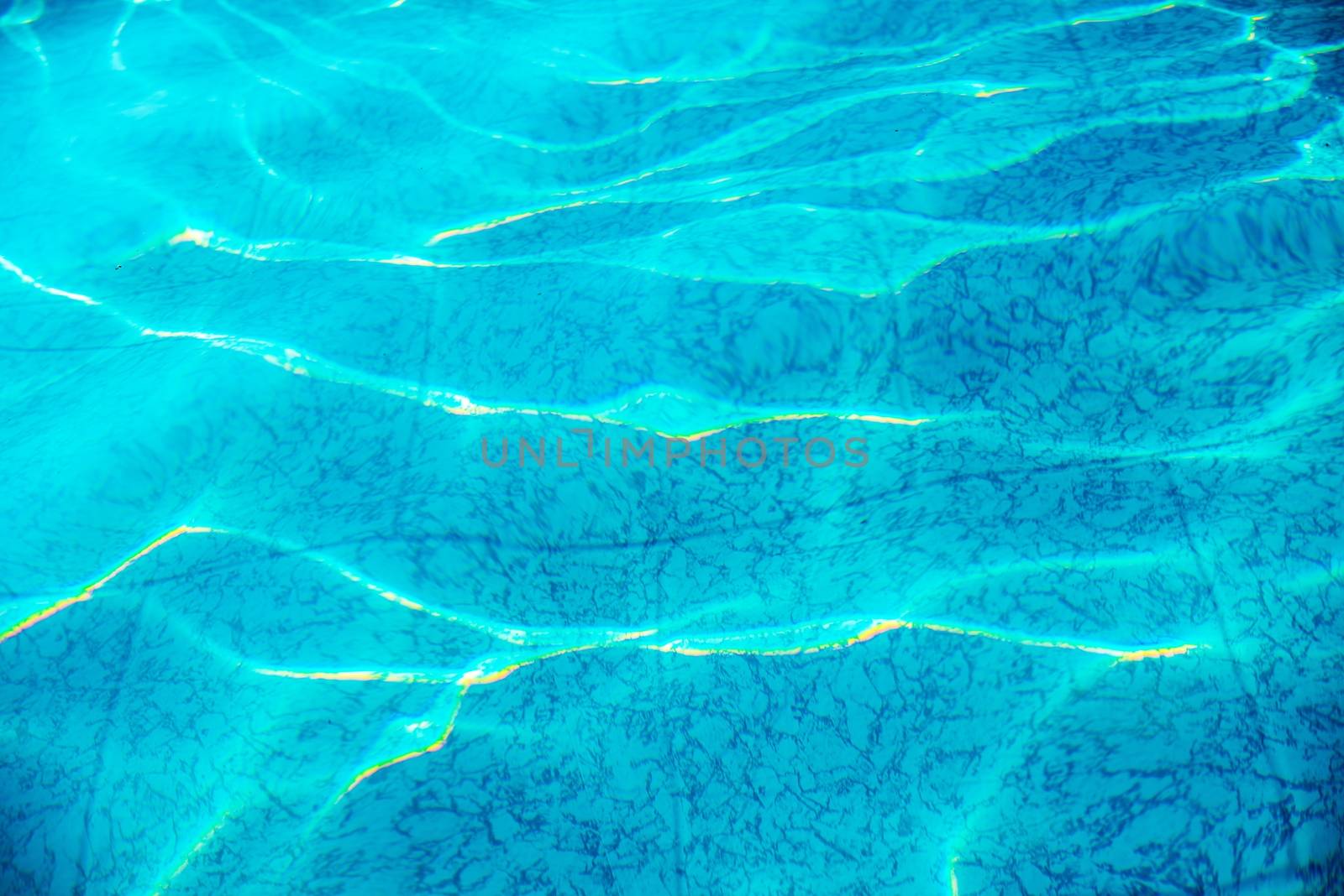 Swimming Pool Water Closeup Photo Background. Crystal Clear Pool Water.