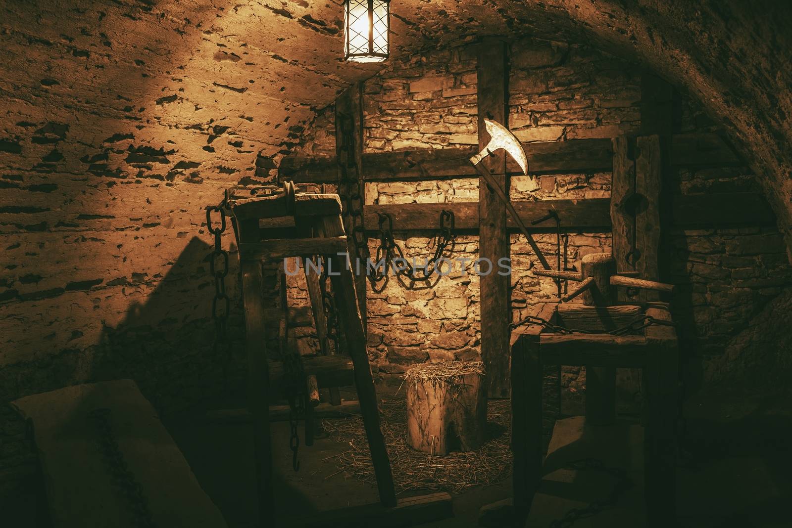 Torture Chamber in Niedzica Castle Located in Lesser Poland, Europe. Dark Torture Room with Many Torture Devices in Vintage Color Grading.