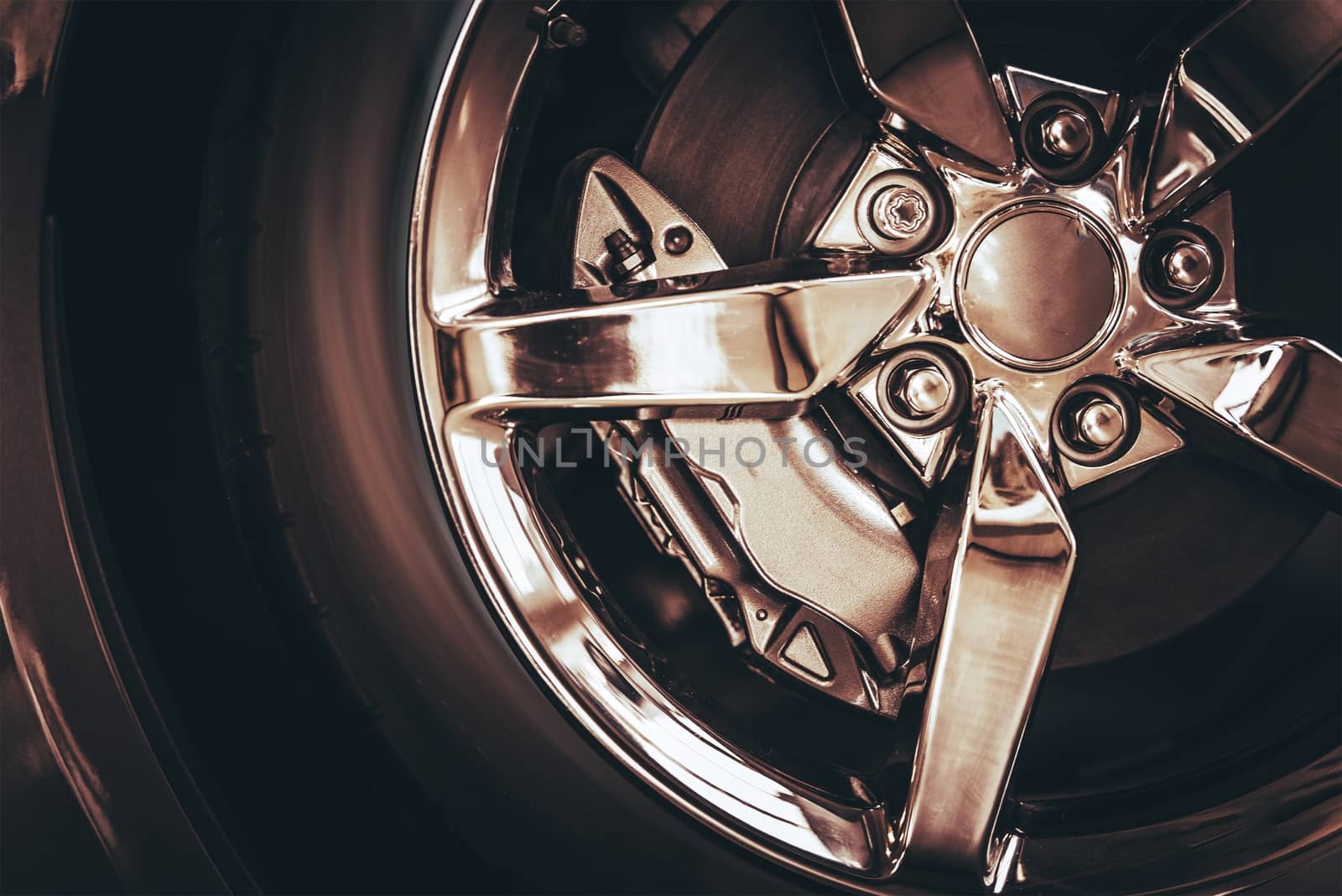 Elegant Chrome Car Alloy Wheel Closeup Photo.