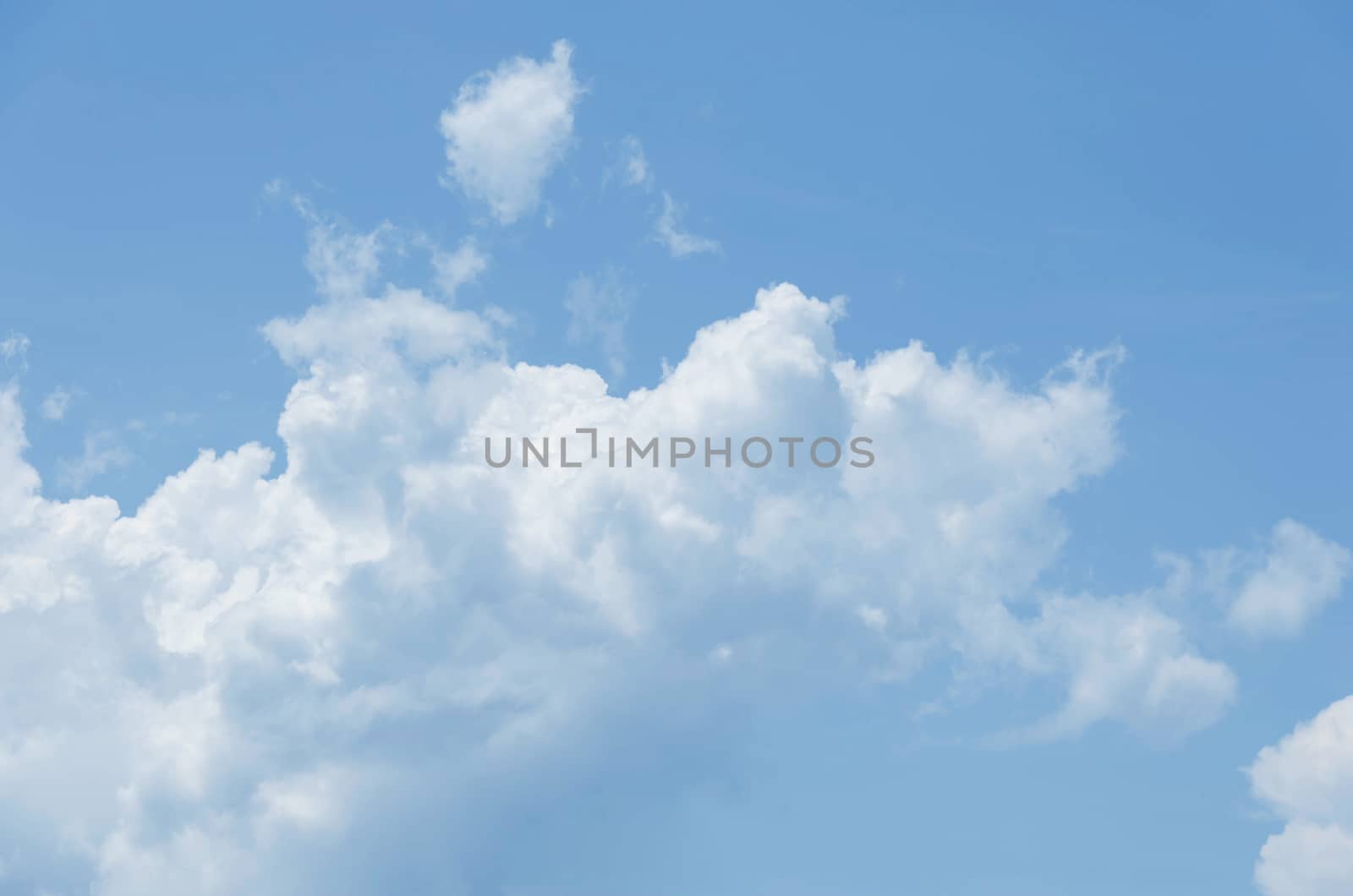 white clouds in the blue sky background