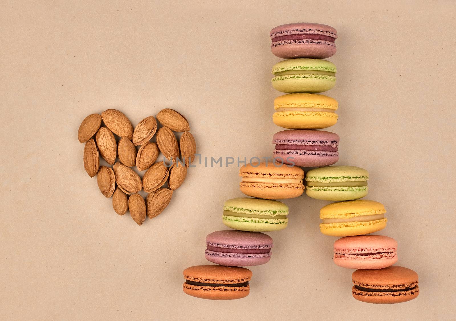 Macarons Eiffel Tower french sweet colorful,  heart of  almond. Fresh pastel delicious dessert on chocolate retro vintage background.Love,Valentines Day,romantic                                       