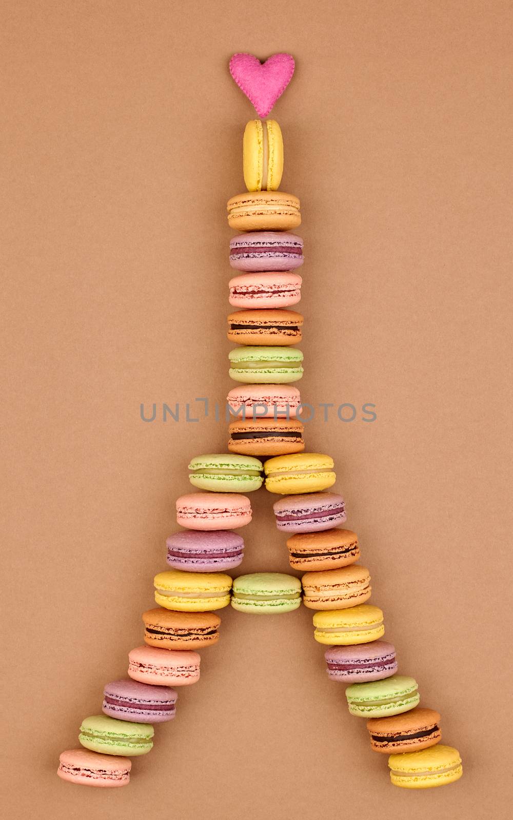 Macarons Eiffel Tower french sweet colorful, pink heart. Fresh pastel delicious dessert on chocolate retro vintage background. Love,Valentines Day,romantic                                       
