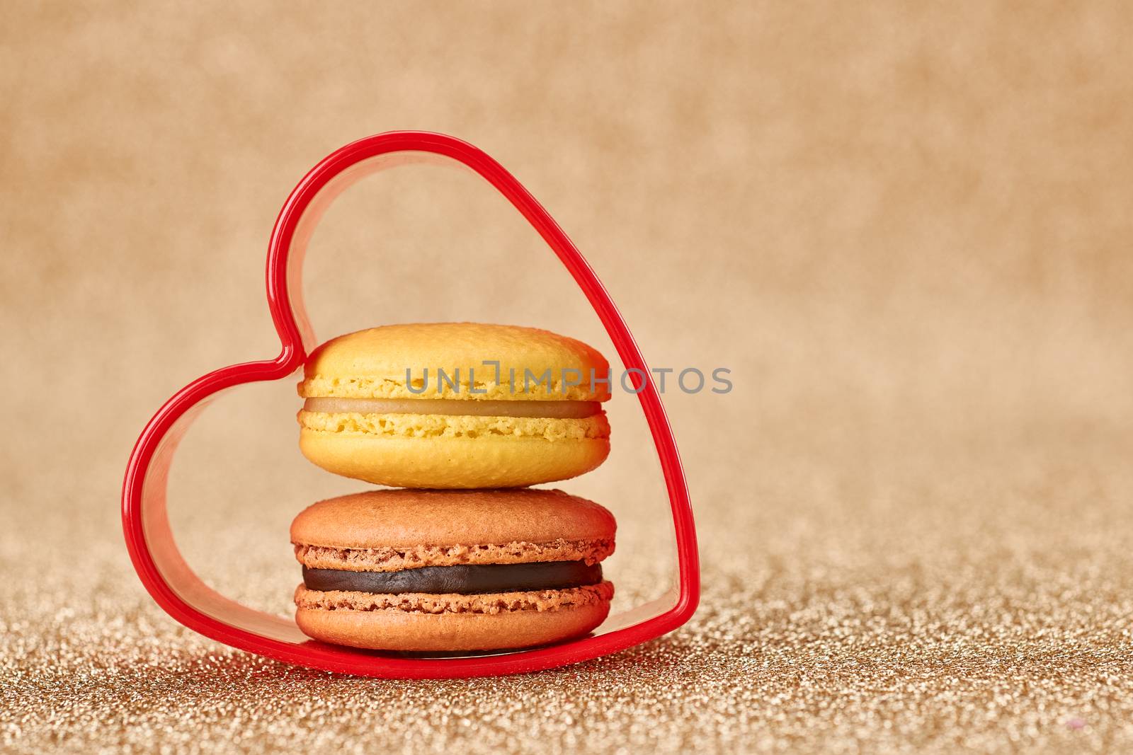 Valentines Day. Love. Red heart, Macaron french sweet delicious dessert yellow, chocolate. Vintage retro romantic style. Unusual creative art greeting card, gold background, copyspace