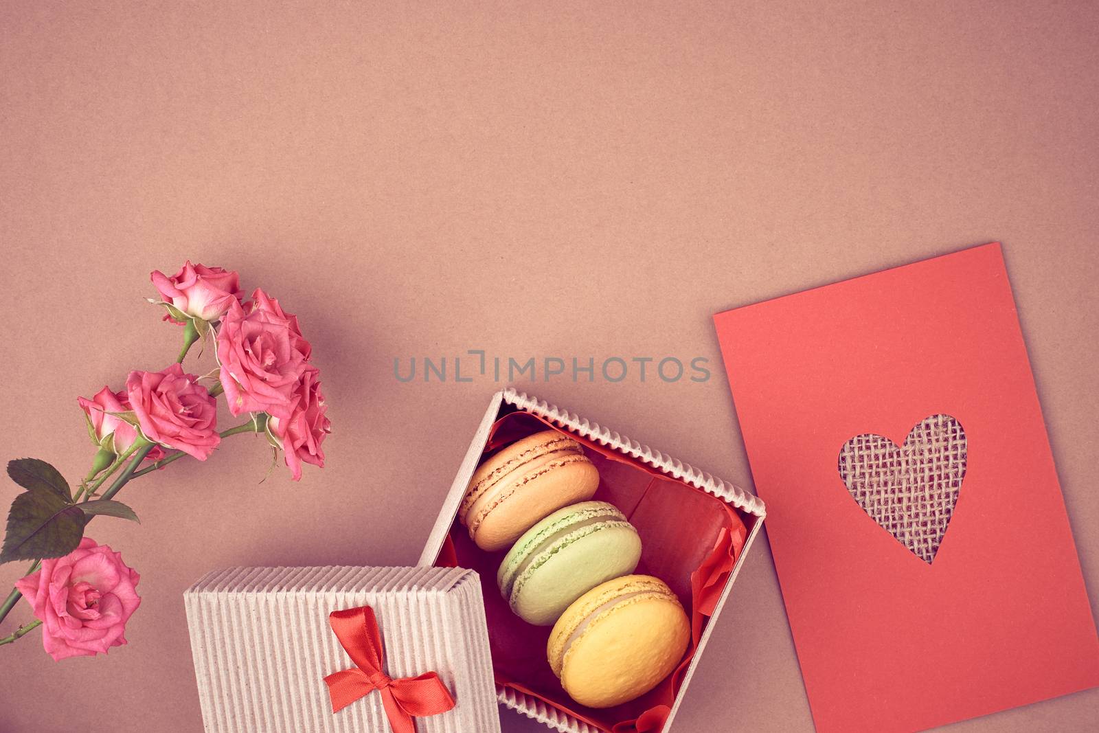 Valentines Day. Love heart, macarons french sweet delicious dessert, pink roses, gift box, present, handmade paper card. Vintage retro romantic. Unusual creative greeting card, background, copyspace