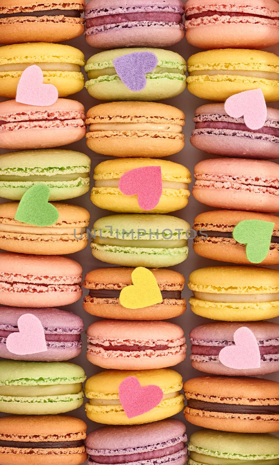 French colorful macarons background, close up by 918