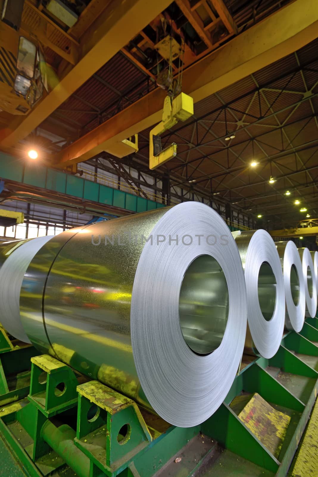 rolls of steel sheet stored in warehouse