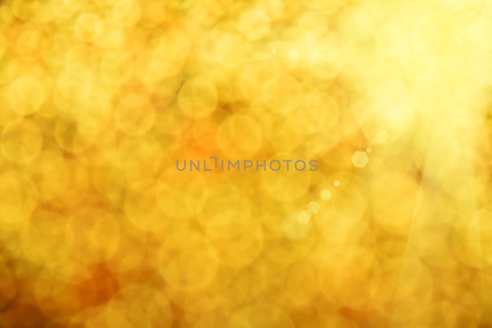 Golden glitter bright magic light circles summer sunshine abstract blur effect background
