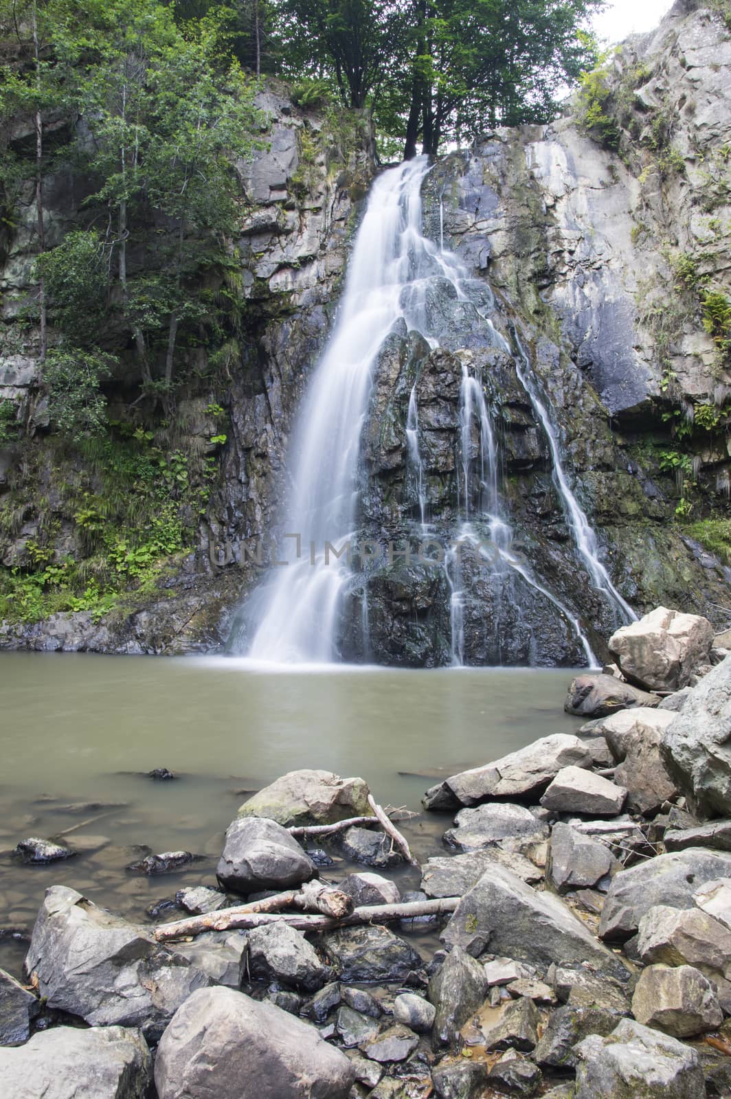 Silky waterfall on a huge rock, Romanian Carpathians.