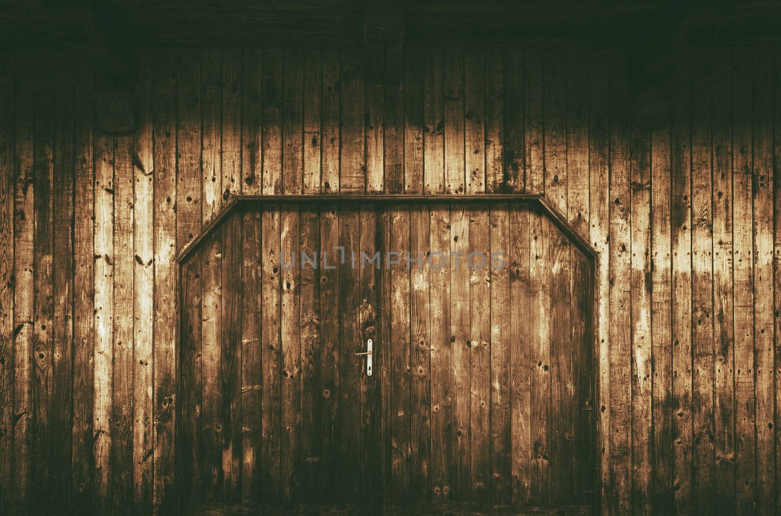 Old Wooden Gate with Doors. Aged Wood Barn Wall.