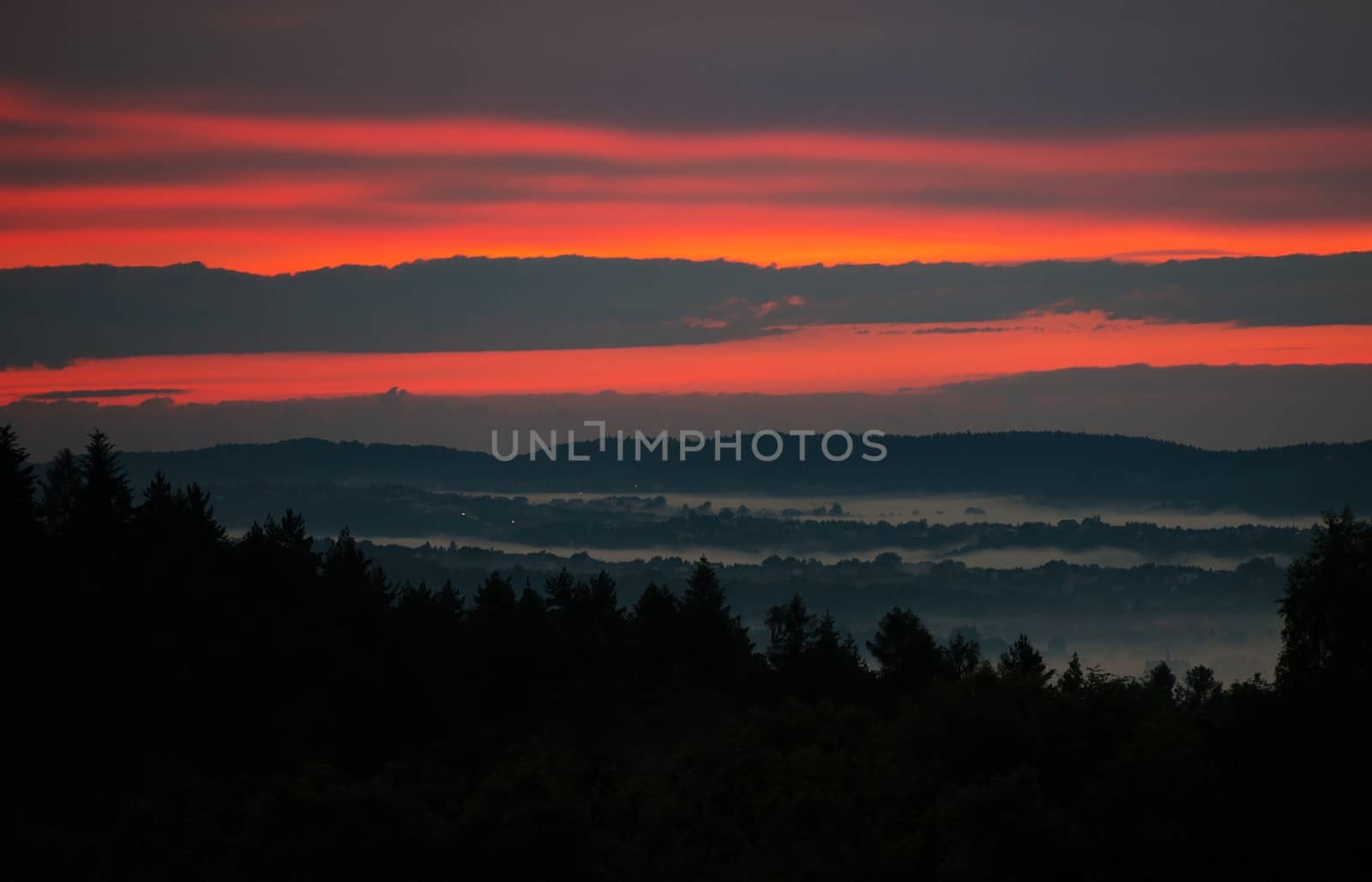 Scenic Foggy Sunset Hills in Lesser Poland, Europe near Krakow.