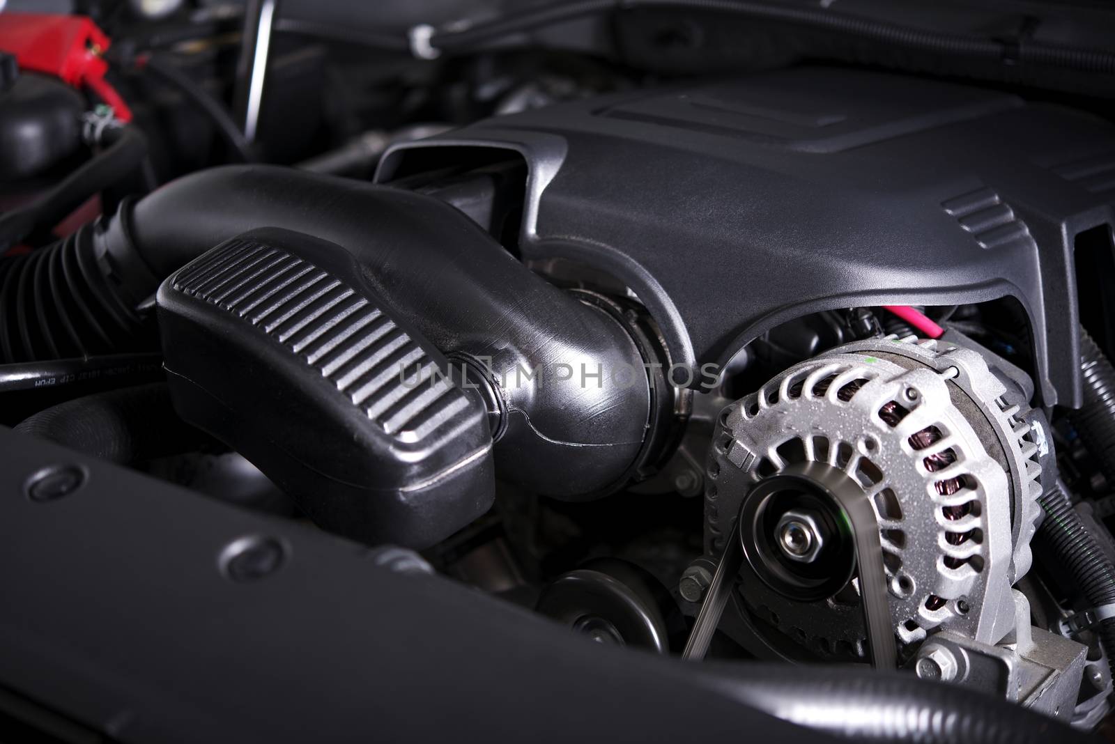 Modern Car Alternator and Gas Engine. Vehicle Engine Closeup.
