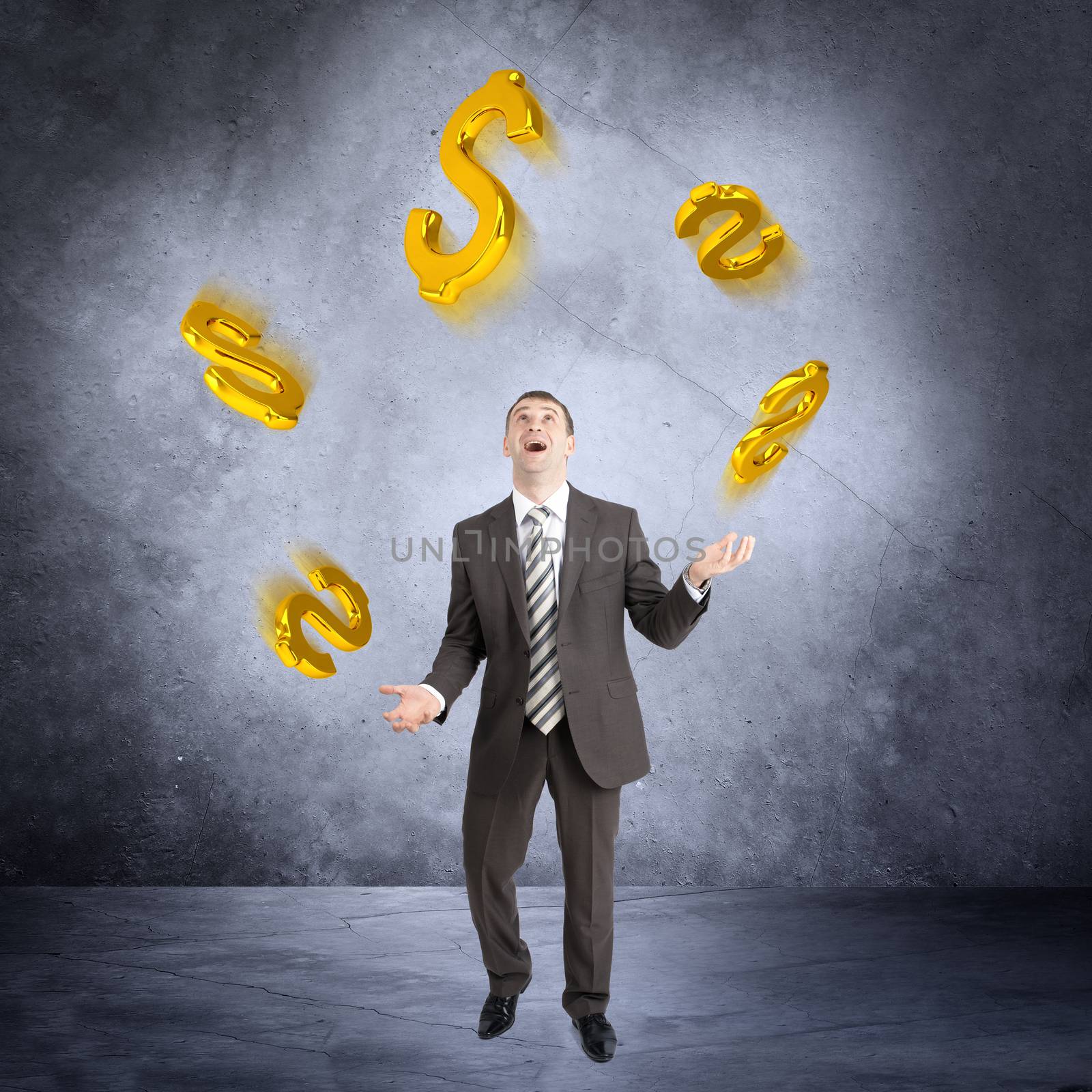 Businessman juggling dollar sign on abstract grey background