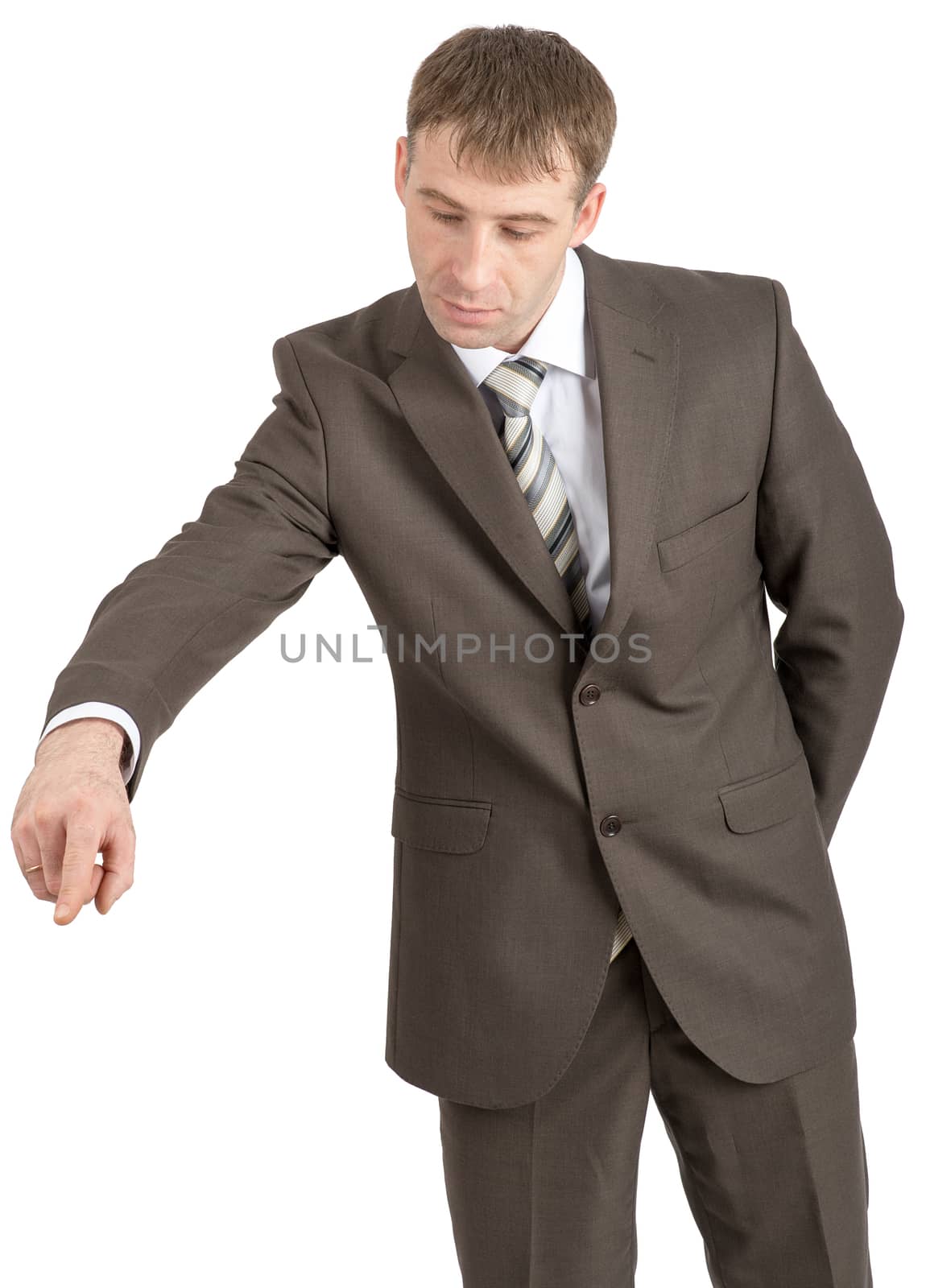 Businessman pointing down isolated on white background