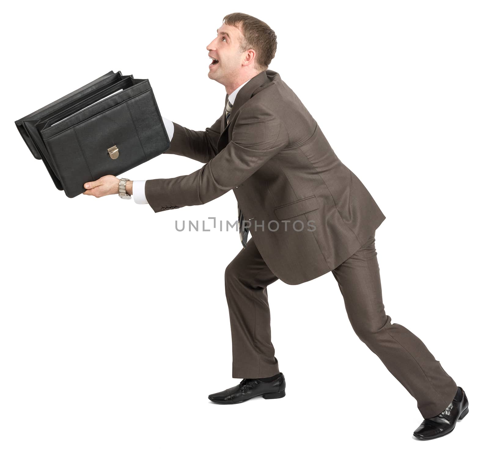 Happy businessman holding open briefcase isolated on white background