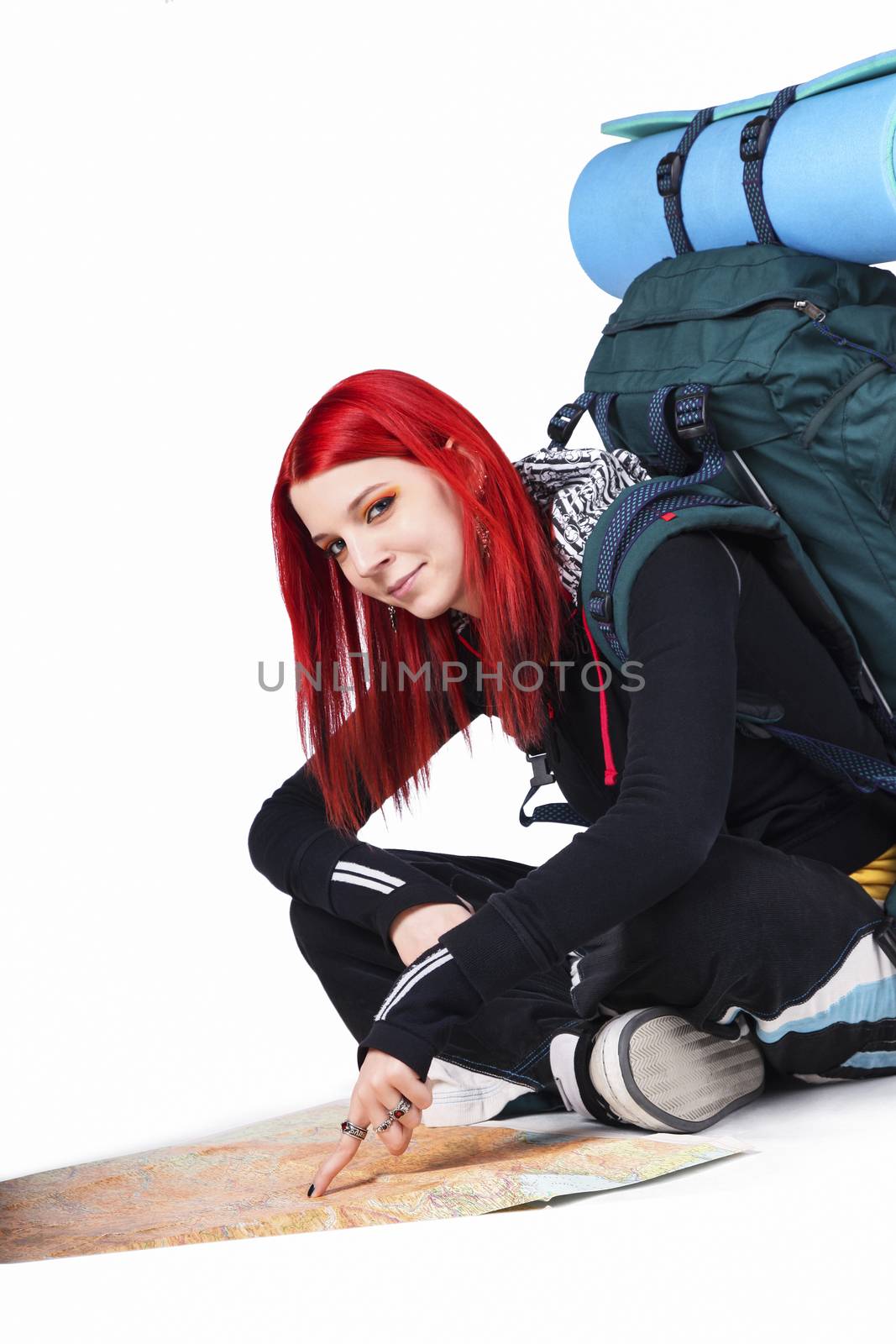 Young Dyed Hair Female Tourist Pointing On Map Over White Background