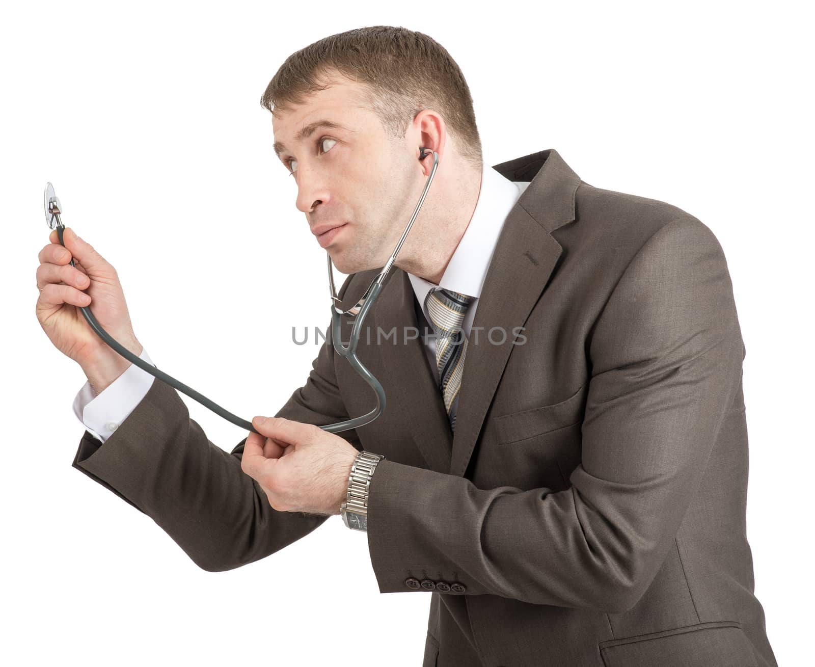 Businessman with stethoscope hearing the empty space isolated on white background