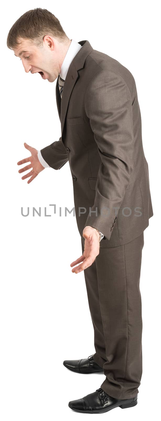 Businessman looking down and shouting isolated on white background, side view