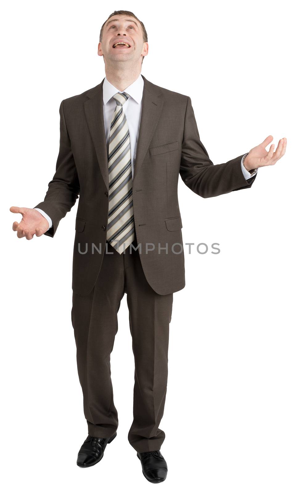 Businessman juggling invisible things and looking up isolated on white background