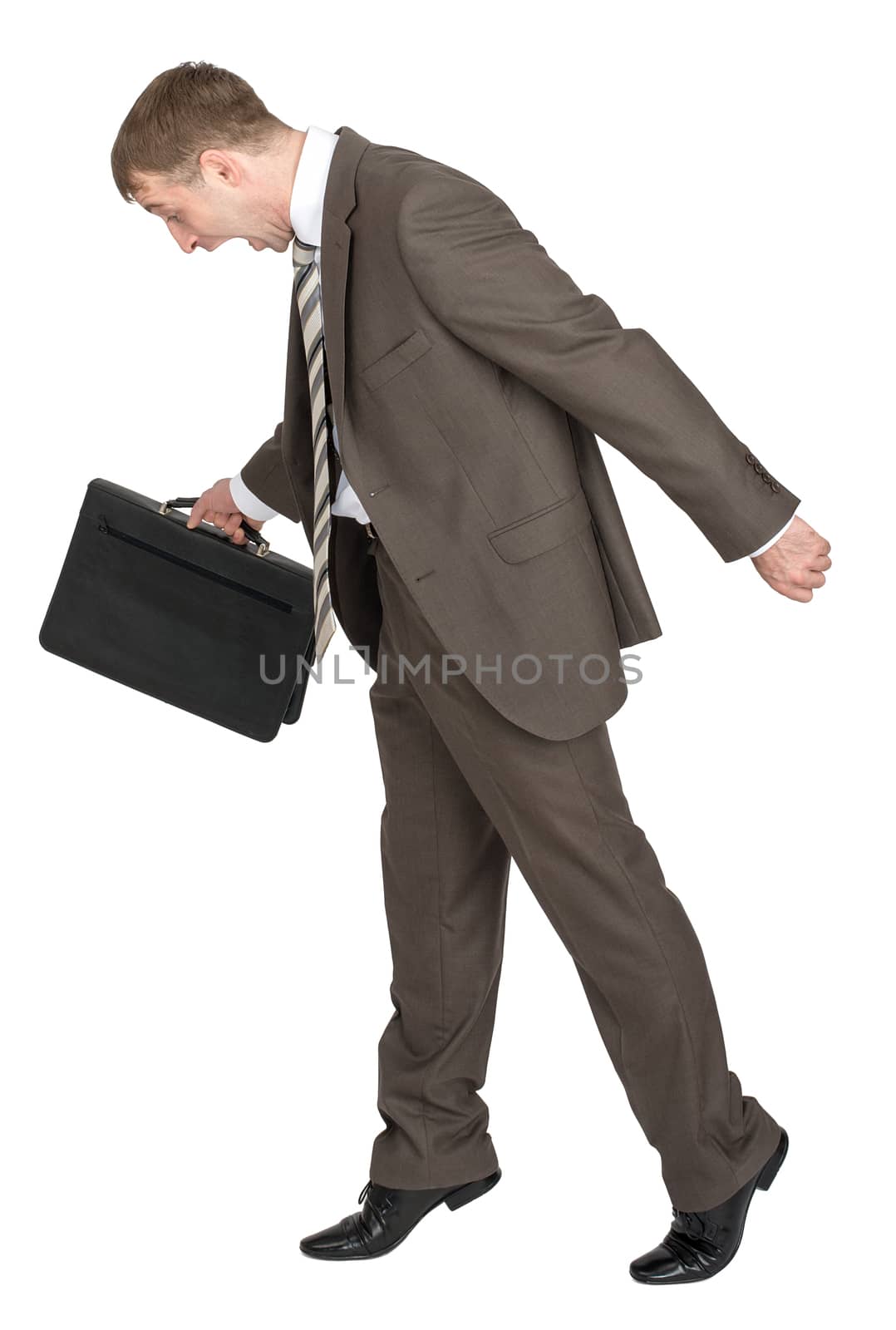 Scared businessman with briefcase looking down isolated on white background, side view