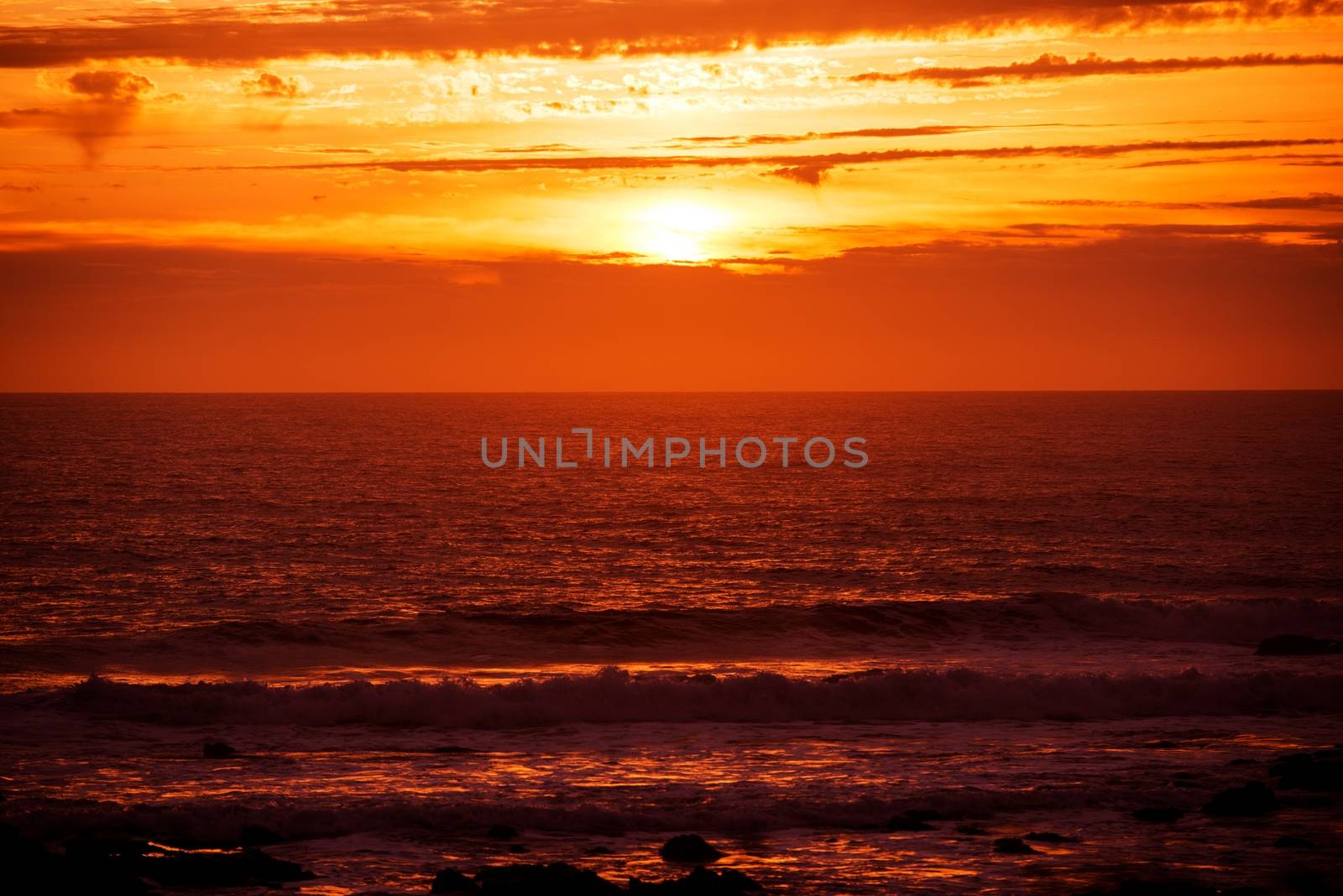 Scenic Red Ocean Sunset. Ocean Scenery.
