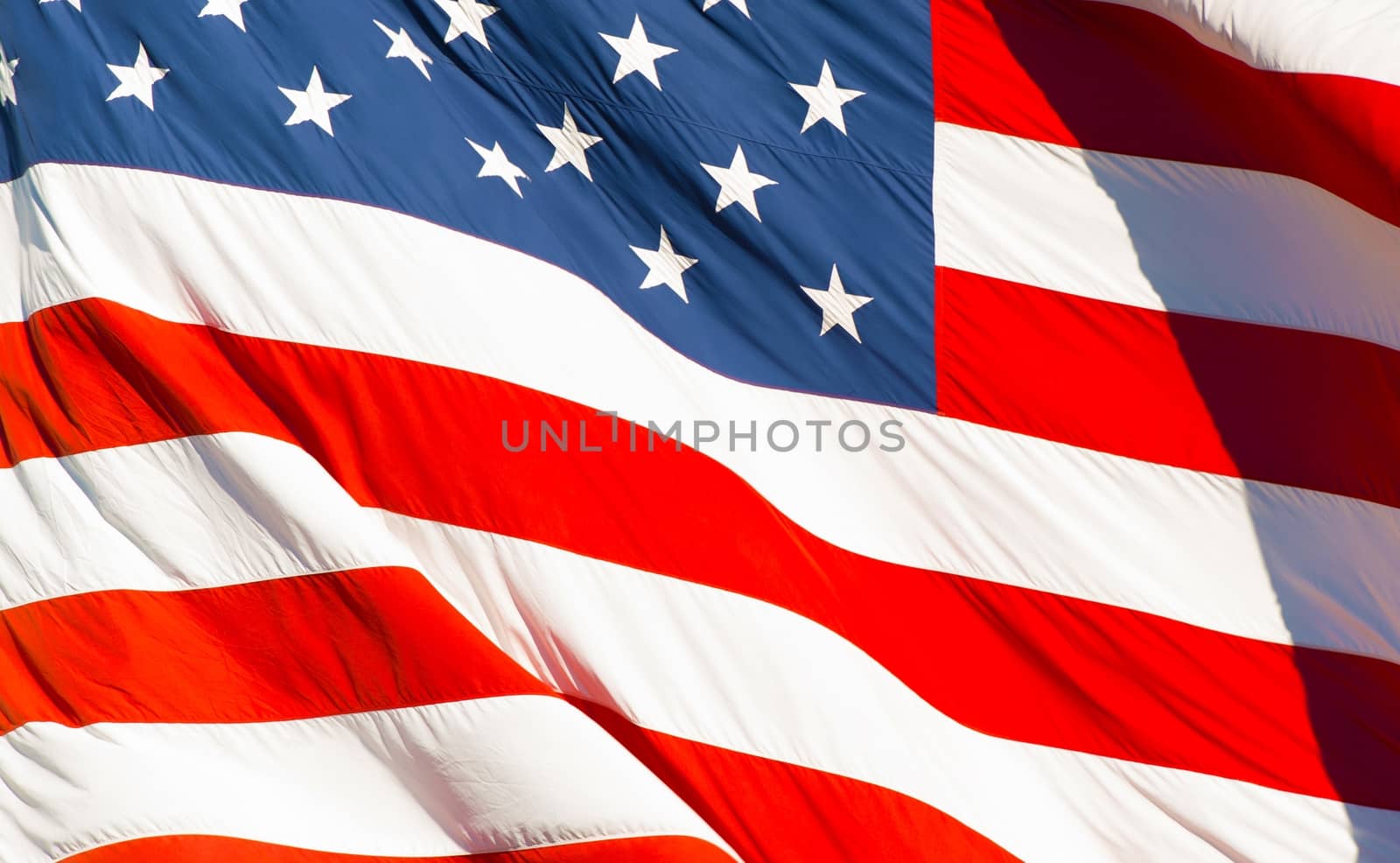 American Textile Flag Waving in the Wind. USA Flag Background.