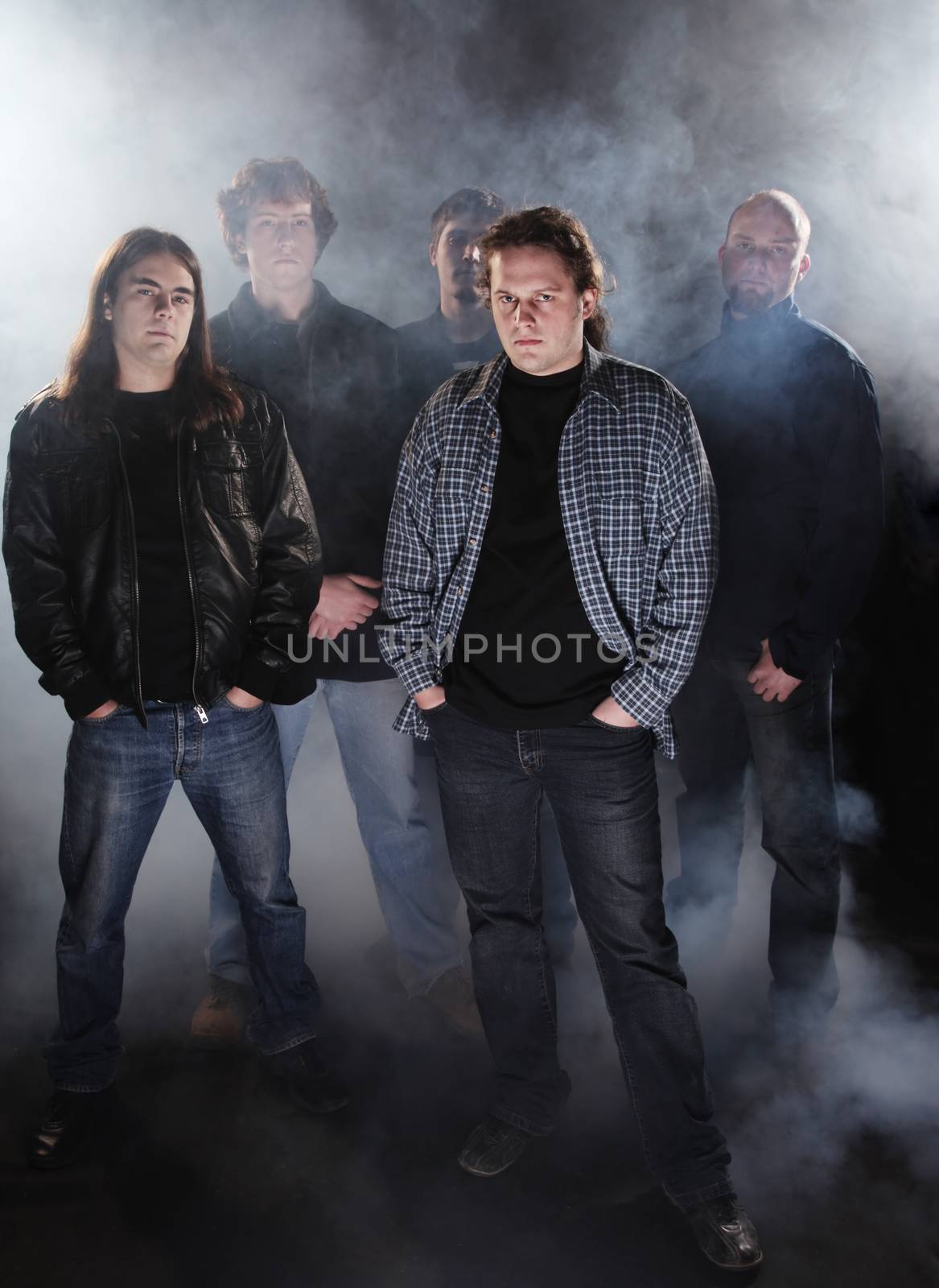 Group portrait of a rock band.