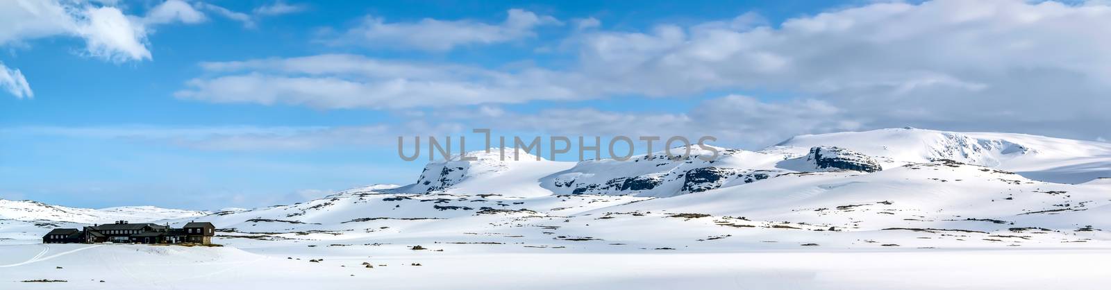 Panoramic view of hotel building in the snowy mountains. Winter. Finse, Norway