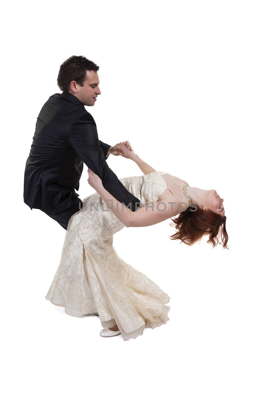 Young Married Couple Dancing Over White Background