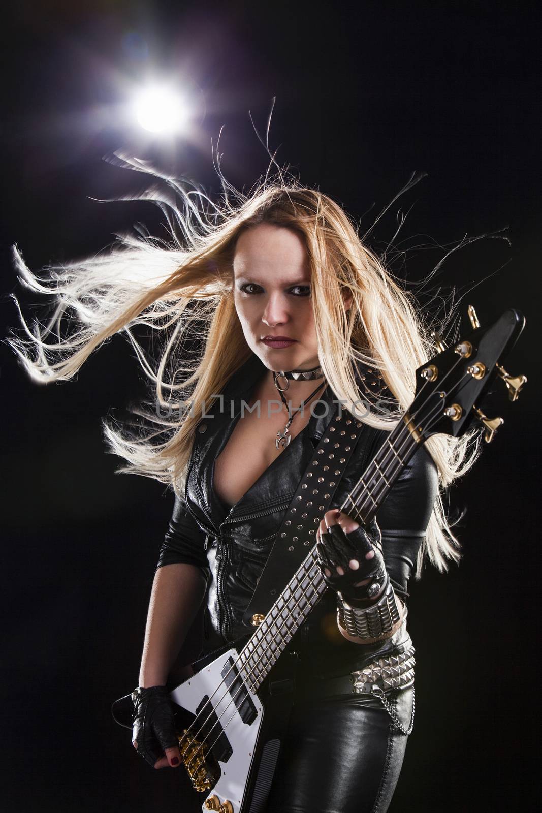 Young Woman Playing Guitar; Indoors