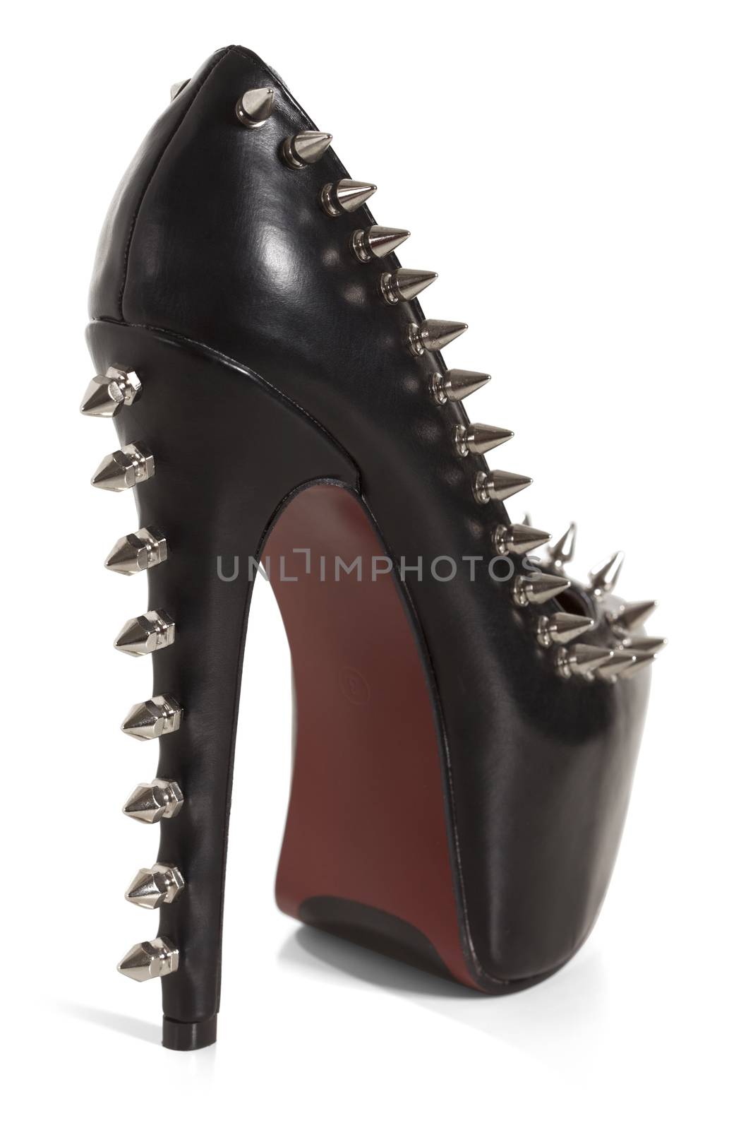 Spike on black high heel shoes isolated on white background