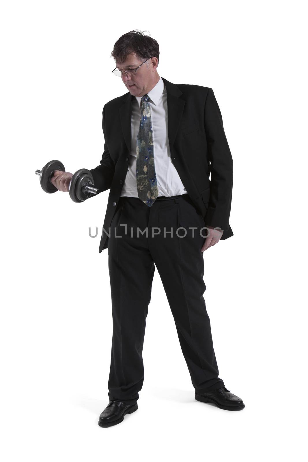 Mature Businessman Lifting Dumbbell Over White Background