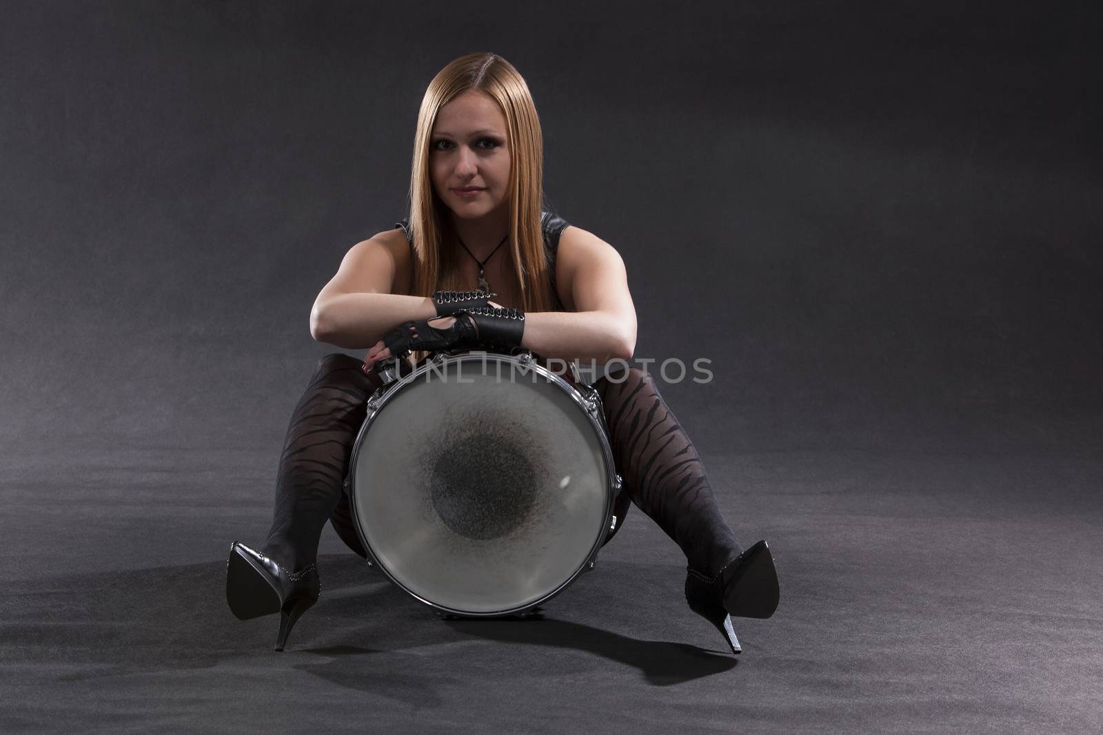 Young Woman Sitting With Drum; Indoor