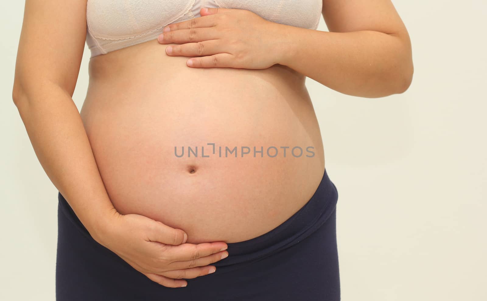 Photo of a cute pregnant woman belly