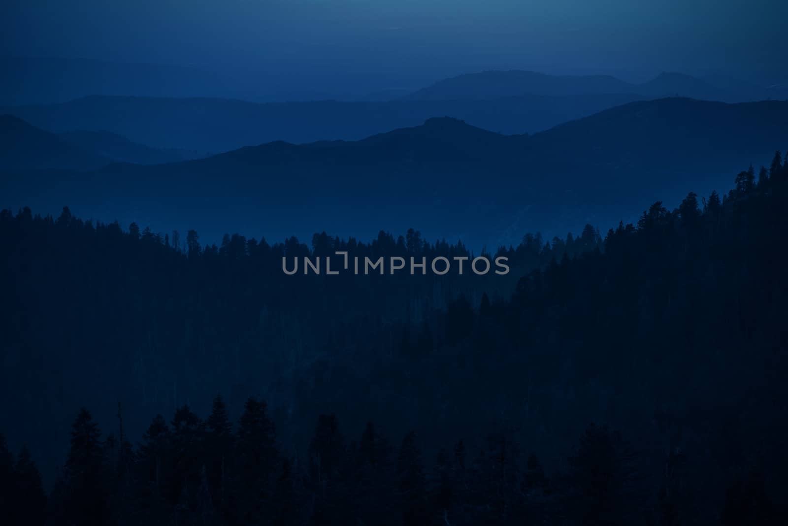 Mountain Hills Silhouettes. Summer Evening in the Sierra Nevada Mountains.