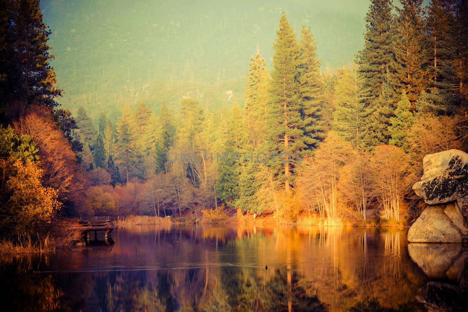 Foggy Sunset at the Lake. Scenic California Mountains Lake.